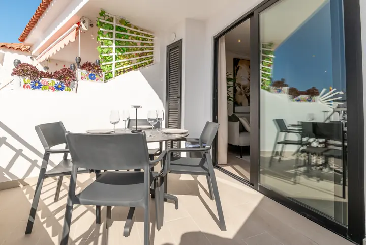 Terrace with dining table